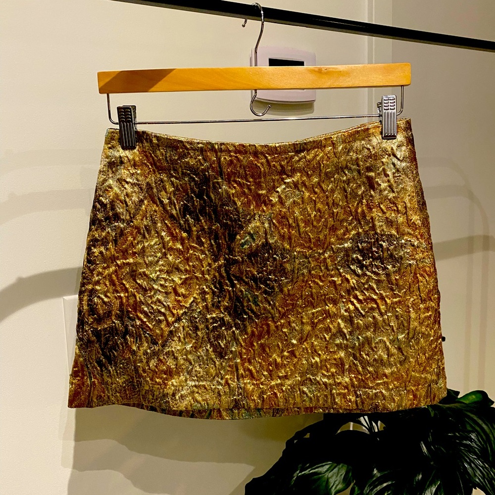 Metallic/chrome/foil floral miniskirt.